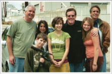 Seven people gathered at a production location